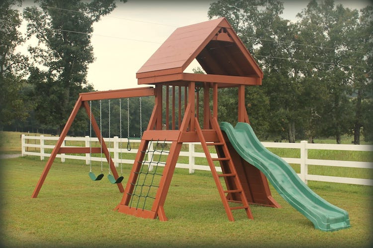 small wooden swing set
